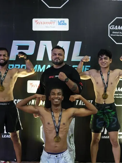 Our senior debut fighters, Mohit, Daksh, and Ayush, flexing with their gold medals. A new team built from zero, now standing at the top, together.