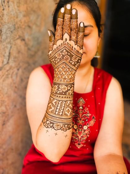 A stylish pose showing off the full length of the arm design.