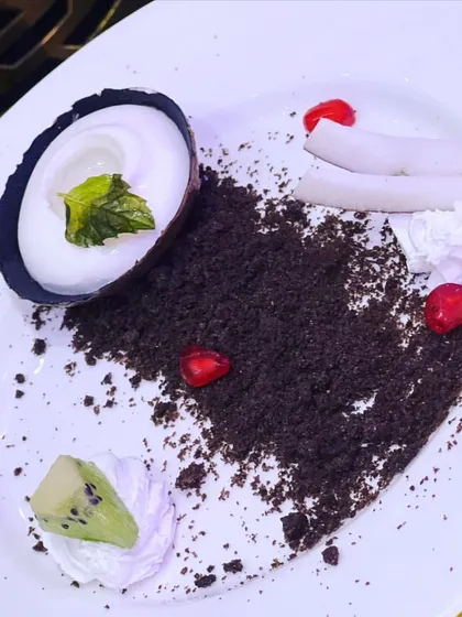 A creative dessert presentation featuring a deconstructed concept with Oreo crumble "soil". I love to play with textures and ideas to surprise and delight guests.