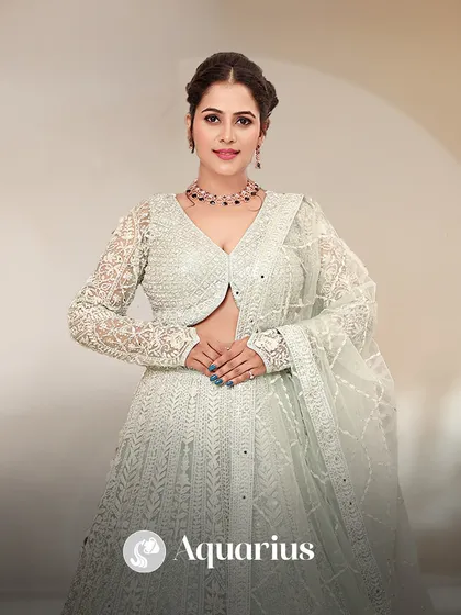 Aquarius, your style is unique and forward-thinking. This ethereal white lehenga with full-sleeve lacework is a perfect match for your individualistic nature.