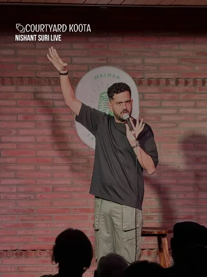 The energy is electric when the Malhar Laugh Club takes over our stage. Here's a shot of Nishant Suri performing to a packed house, proving that our space is as much for roaring laughter as it is for quiet reflection.