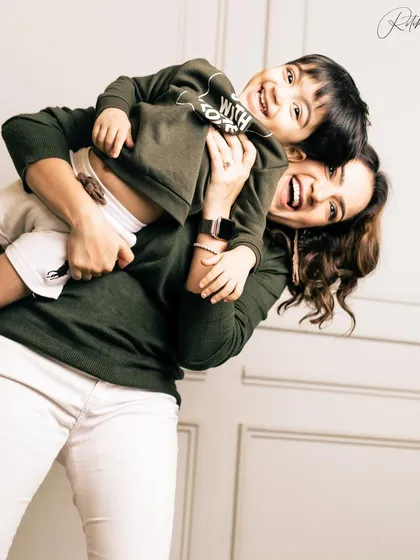 The pure, uncontainable joy of a mother playing with her son. My sessions are filled with movement and laughter like this, where I step back and let your natural connection shine through.