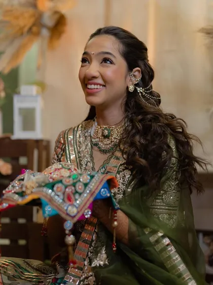 The bride during a traditional ceremony, her hair looking flawless.