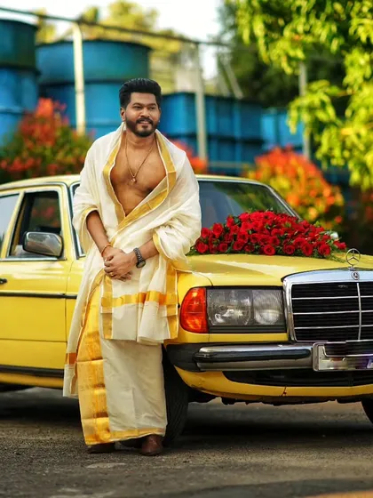 A classic shot of actor Chandhu Nair for his wedding. We gave him a traditional Kerala groom look, complete with a classic mundu and a confident style.