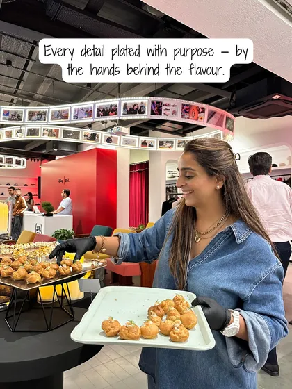 Every detail is plated with purpose by the hands behind the flavour. Here I am, putting the finishing touches on a tray of appetizers for an event.