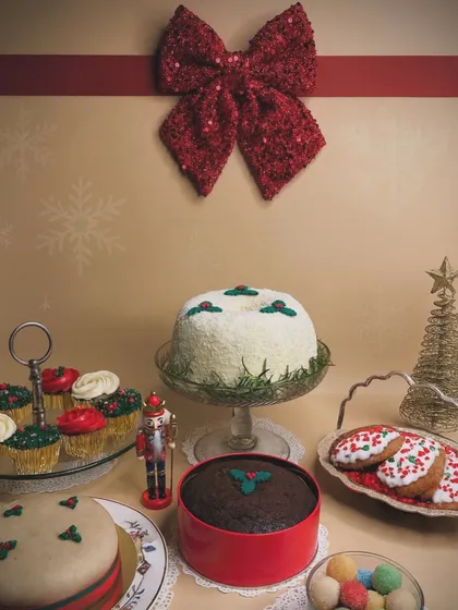 This is what my Christmas dreams are made of. Our full holiday spread includes everything from the Tom Cruise-inspired coconut bundt and traditional fruit cake to festive cupcakes and marzipan, all crafted with comforting, nostalgic flavors.