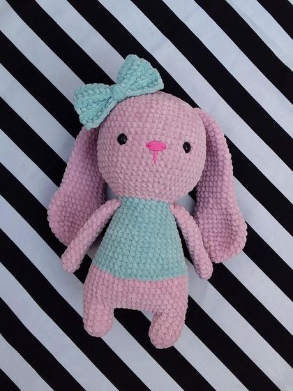 The full view of the custom plush bunny. Her long, floppy ears and soft body make her the perfect cuddly companion.