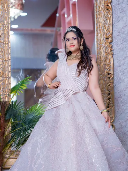 A full-length shot of the princess gown, showing its beautiful silhouette against an elegant mirror.