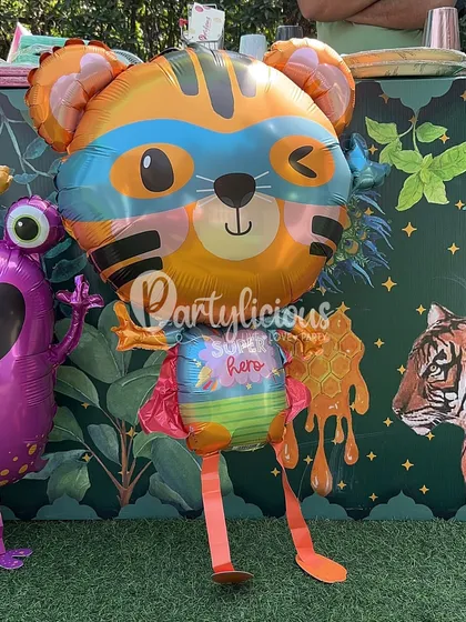 It's all about the fun characters! This superhero tiger foil balloon was a quirky and colorful addition to our jungle-themed stall, showing how we can mix and match elements to create a unique vibe.
