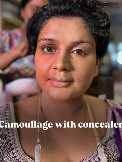 After color correcting, we camouflage with a concealer that matches the skin tone. This step is crucial for building coverage without making the makeup look heavy.
