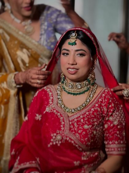 Helping my bride Hiral with her dupatta. These getting ready moments are so special, and I love being a part of them.