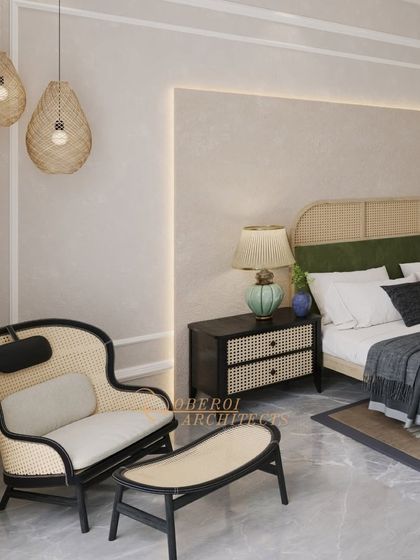 The hanging rattan light fixtures and classic wall paneling add layers of texture and sophistication to this beautifully designed bedroom.