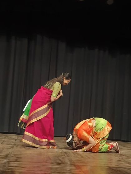 Another student shows her respect in the traditional way after her performance. This beautiful custom is a reminder of the deep bond and mutual respect we share in our dance family.