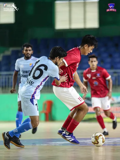 A tough battle for possession during the quarter-final game.