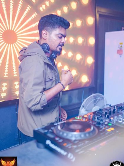 In my element at Drava Lounge. The background lighting gives this shot a warm, energetic feel, reflecting the vibe of the night.