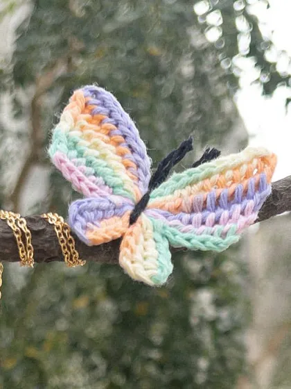The 'Titli' necklace in the bestselling multi-color pastel. It's a beautiful, delicate piece that's perfect for gifting.