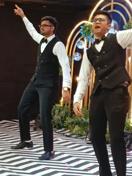 The groom's side bringing their A-game with a perfectly synchronized dance performance. I love seeing families come together to create these fun and memorable moments on the Sangeet stage.