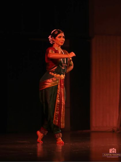 A graceful pose from my solo recital at the India Habitat Centre. Each performance is an opportunity to connect with the audience and share the beauty of this classical art form.