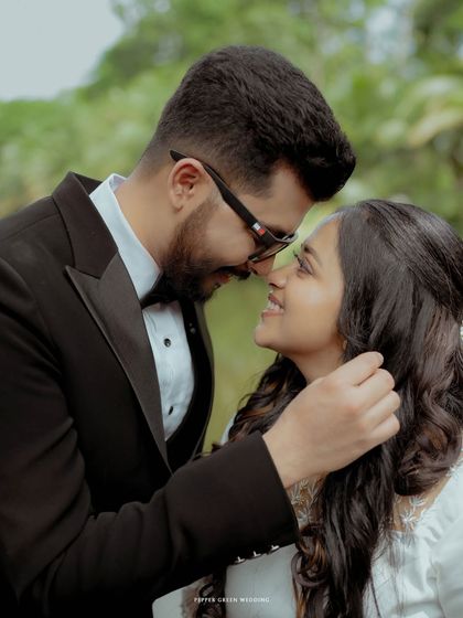 An intimate close-up of the bride and groom, their smiles and loving gaze telling a story of deep connection.