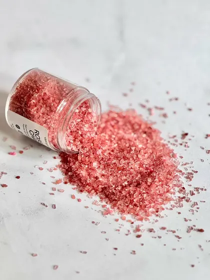 A beautiful spill of our Rose-Tic Charm bath salts. The mix of Himalayan pink salt and rose petal powder creates a stunning visual and a calming aroma.