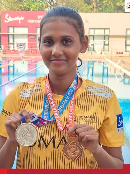 Surbhi Shrikrishna Shinde shows off her silver and bronze medals won in the 400m Bi-Fins category at the 5th National Finswimming Championship.
