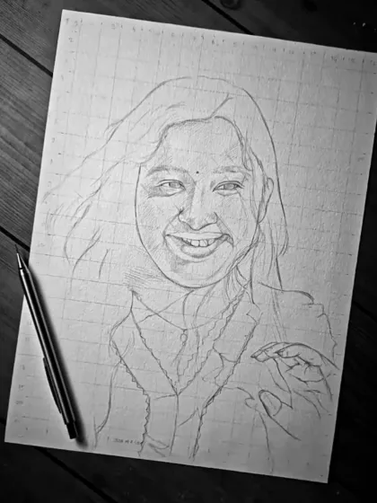 The first step is always a precise outline using the grid method. This ensures all the proportions are accurate before I begin the detailed shading work.