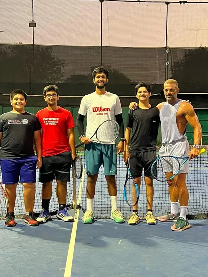 Another fantastic group of players after a challenging and rewarding session on the court. The camaraderie is a huge part of the experience here.