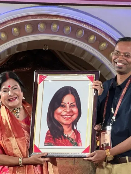 The joy on a person's face when they receive their caricature is the best part of my job. I had the honor of presenting a framed portrait to the wonderful singer Malini Awasthi ji on stage at the Timeless Ayodhya Festival.