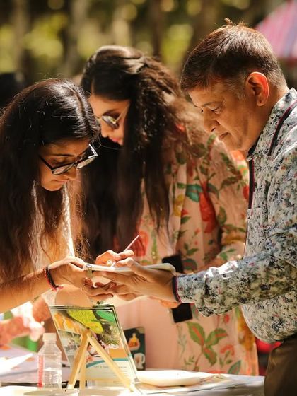 Guiding guests at a DIY art station during a wedding. I'm always there to help everyone feel comfortable and creative.