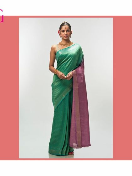 A full-length view of the green and purple silk linen saree, showcasing its rich, earthy tones and understated luxury.