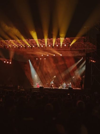 The stage of the Anoushka Shankar tour, with large screens providing close-up views for the audience. We utilize advanced AV technology to ensure that even in a large venue, every fan has an intimate experience.