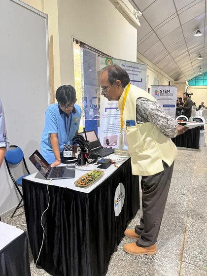 We celebrate our students' real-world impact. Here, our student Yashas Gupta presents his award-winning robotic hand glove, a project designed to help paralytic patients, which won the "Future Ready Solution" award at a national STEM exhibition.
