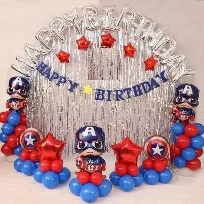 Here is another take on a superhero theme, focusing on Captain America. This home birthday decoration includes character foil balloons, a silver fringe backdrop, and balloon pillars in red, white, and blue.