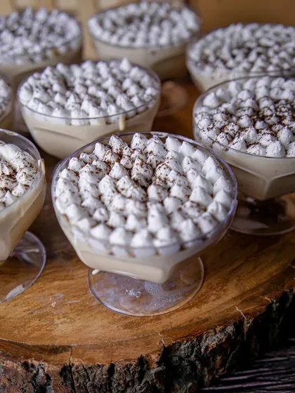 Our Tiramisu Mousse cups are a heavenly indulgence. We layer rich, coffee-infused cream and top it with piped whipped cream and a dusting of cocoa powder for an elegant finish.