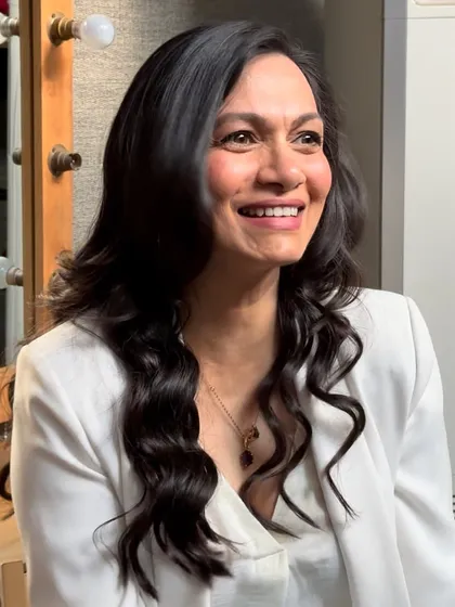 A happy, candid moment from a shoot. This look proves that simple, clean makeup and soft waves are always a beautiful choice.