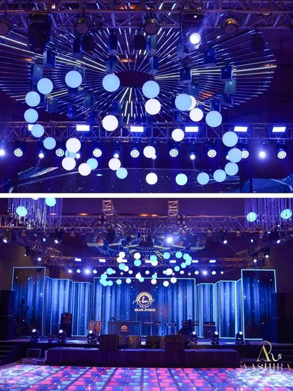 Lighting is key to creating a party atmosphere. This stage featured a dynamic installation of vertical light bars and a ceiling of spherical bulbs for a high-energy, concert-like feel.