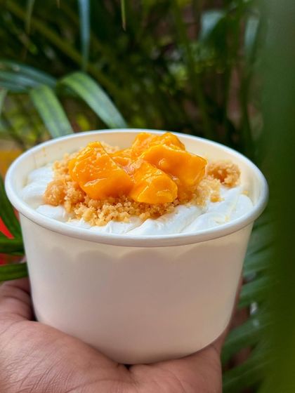 My Mango Cheesecake Pot is the ultimate summer dessert. It has layers of fresh Alphonso mangoes, eggless liquid cheesecake, and a salted butter biscuit crumb.
