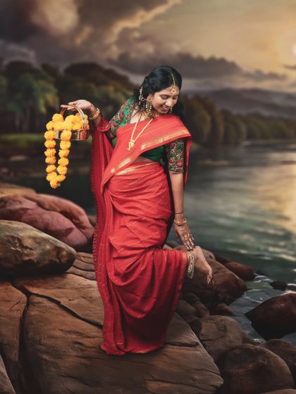 Recreating the serene beauty of rural India indoors. This stunning maternity shot tells a story of love and anticipation with traditional attire.