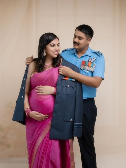 Salute to love and service. An Indian Air Force Captain adorns his wife with his service coat in a beautiful blend of love, pride, and sacrifice.