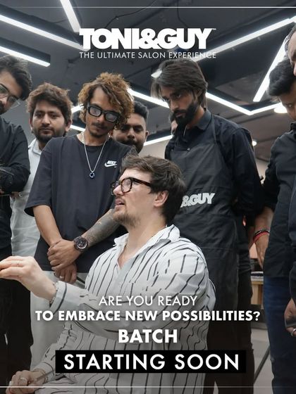 "Are you ready to embrace new possibilities?" An instructor demonstrates a technique to an attentive group of students, capturing the collaborative and mentor-driven nature of our hairdressing courses.
