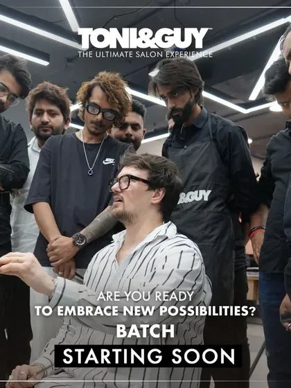 "Are you ready to embrace new possibilities?" An instructor demonstrates a technique to an attentive group of students, capturing the collaborative and mentor-driven nature of our hairdressing courses.
