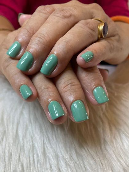 A beautiful mint green gel polish, perfect for adding a pop of color.