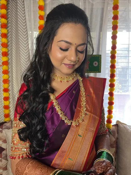 Another beautiful shot of the bride, showing the soft curls in her hair.