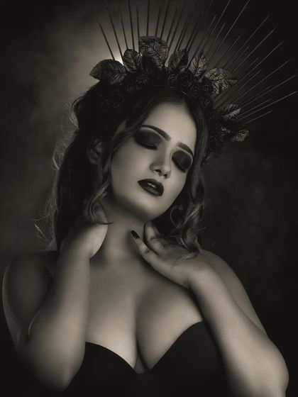 A final black and white shot of the gothic theme, capturing a serene yet powerful expression. This demonstrates how the makeup translates effectively in both color and monochrome photography.