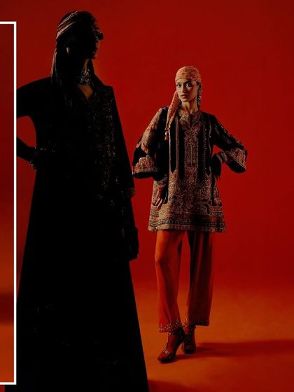 A high-contrast, shadowy image from the Debyani & Co shoot, creating a sense of drama and mystery.