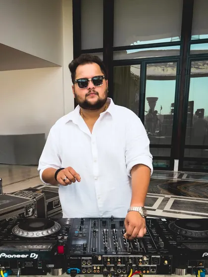 A clean shot of me at the Pioneer DJ console, ready to start the party. This is where I craft the soundtrack for the night.