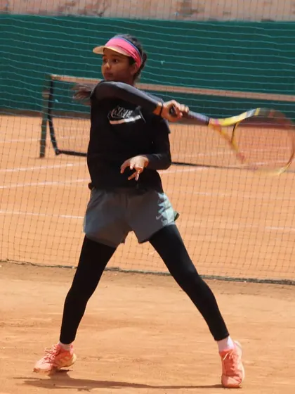 A clean backhand swing. We focus on developing simple, efficient strokes that hold up under pressure.