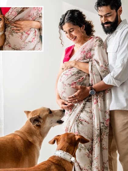 A beautiful composition of a couple expecting, with their two Indie dogs looking on with curiosity. The natural light and loving glances make this a truly special family moment.