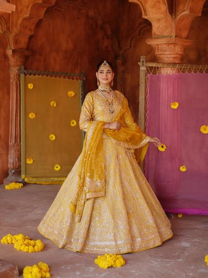 A beautiful portrait from the same shoot. The makeup is kept classic and radiant to let the stunning outfit and jewelry shine.