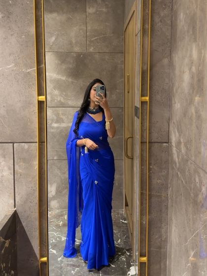 A selfie in a simple yet elegant royal blue saree, showing a classic look for any occasion.